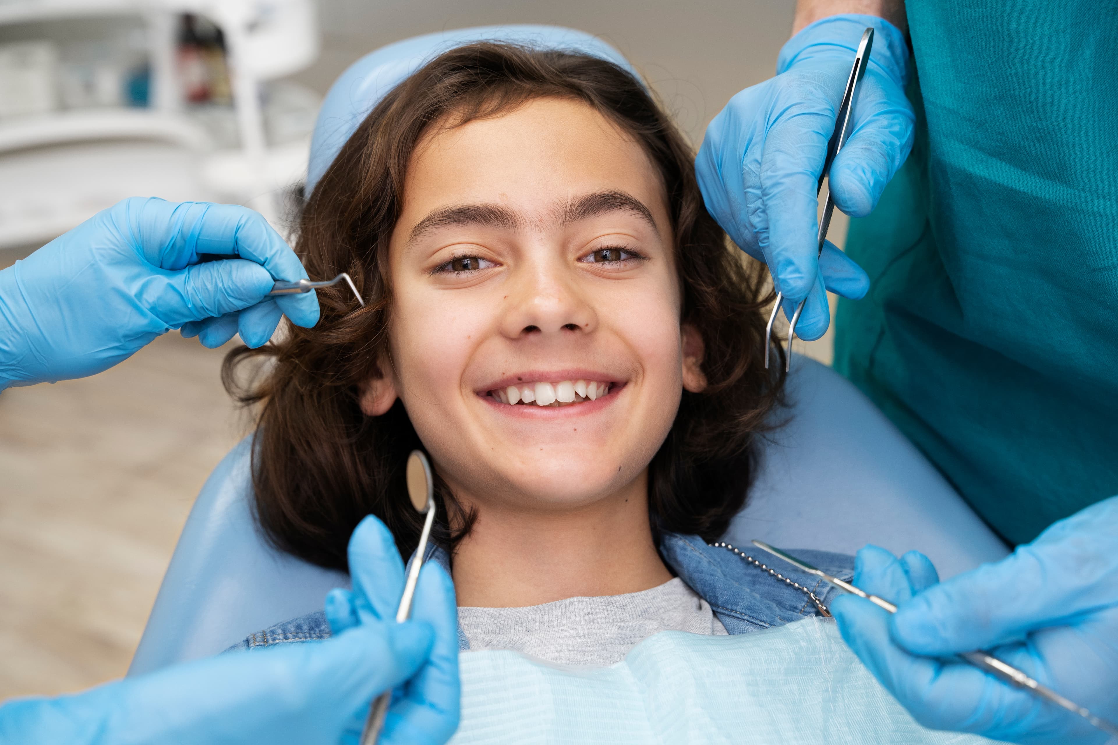 Smiling child in dental chair