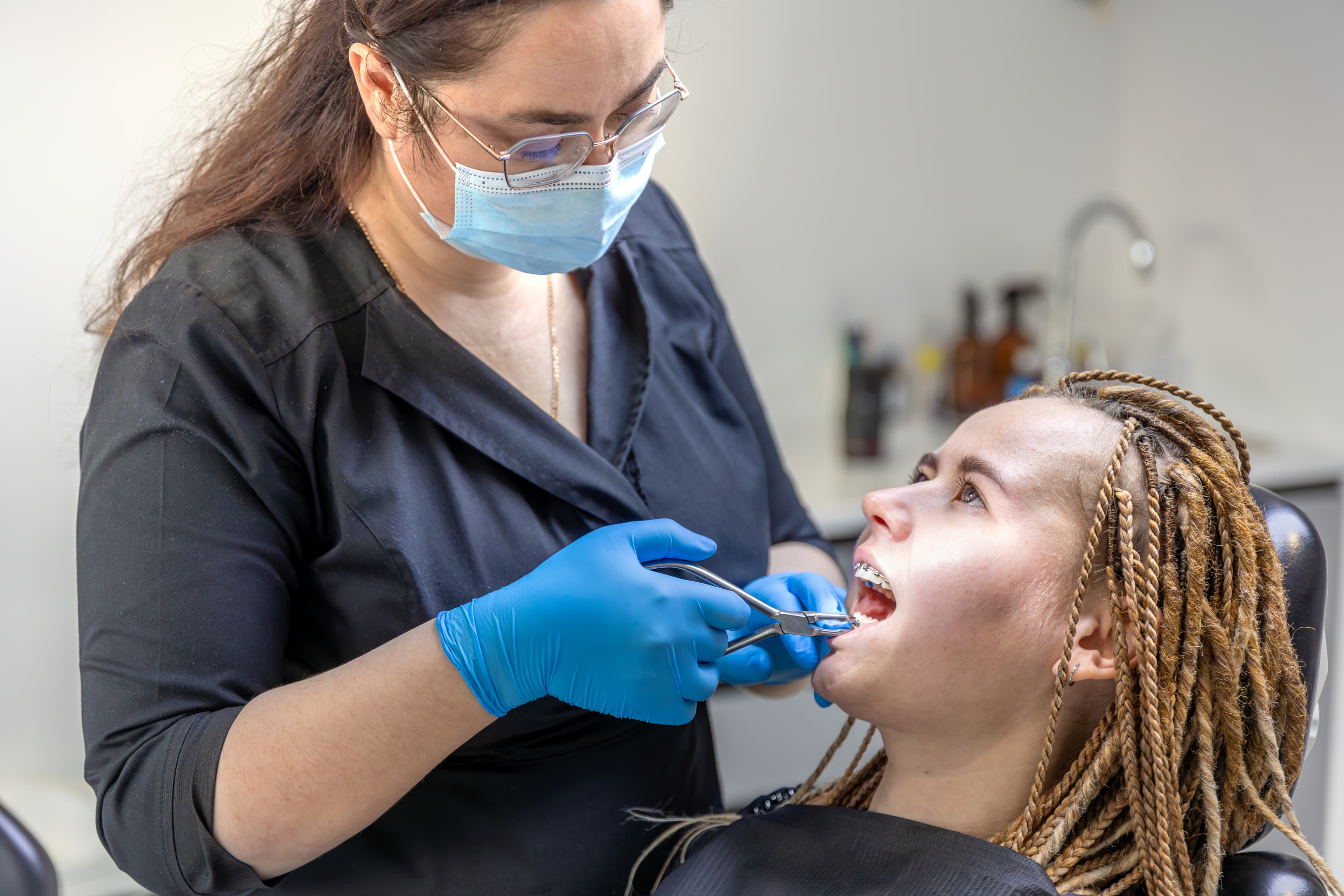 Dentist treating patient
