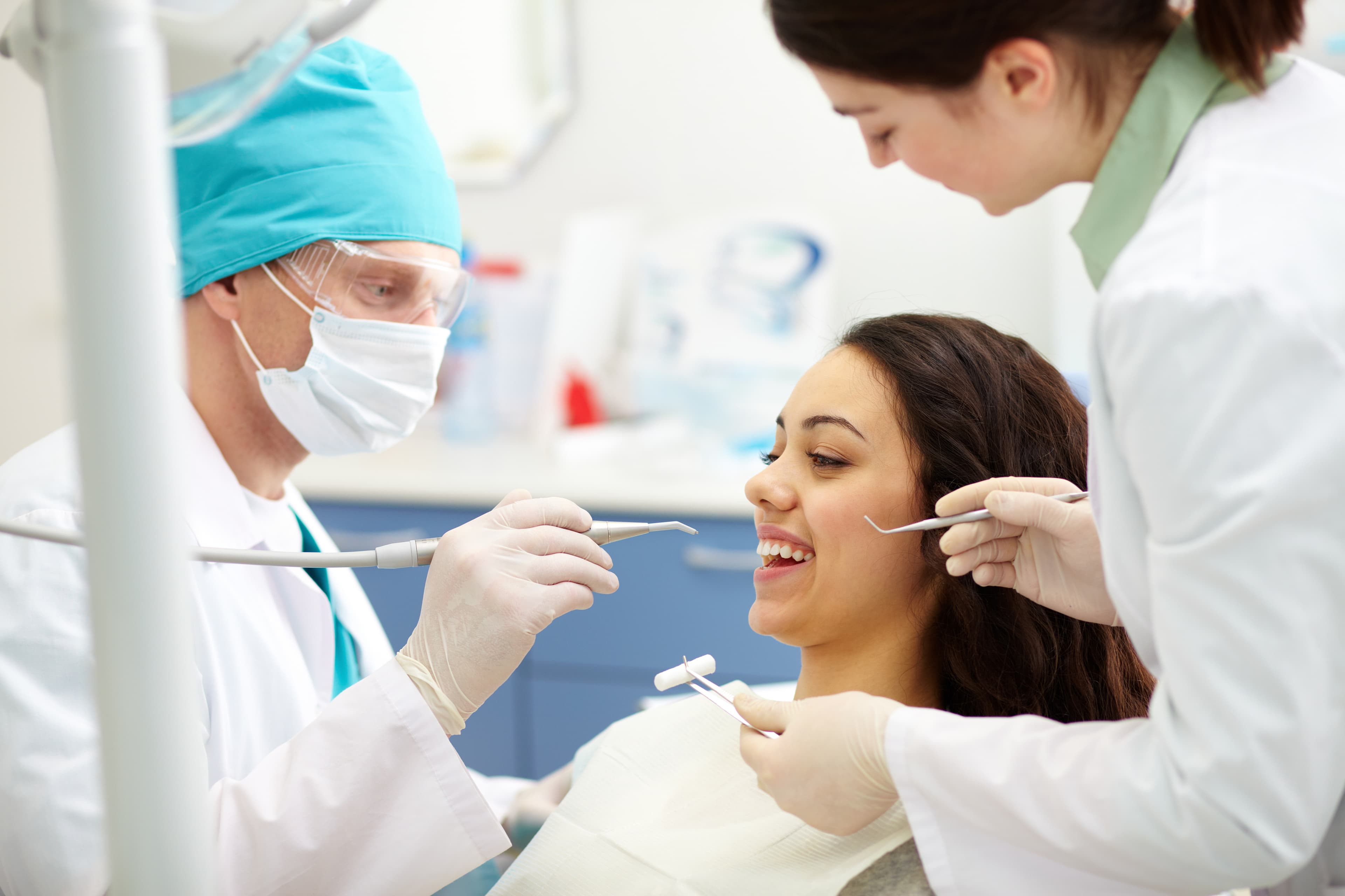 Dentist treating patient